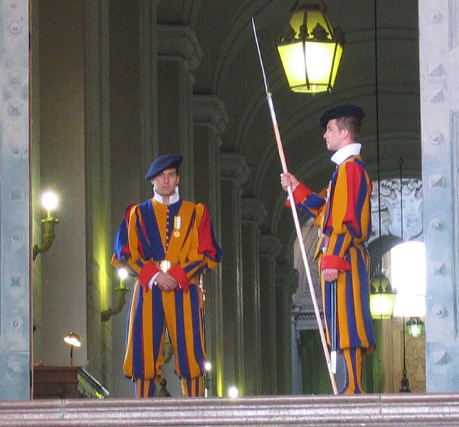 Why do swiss guards guard the Vatican?